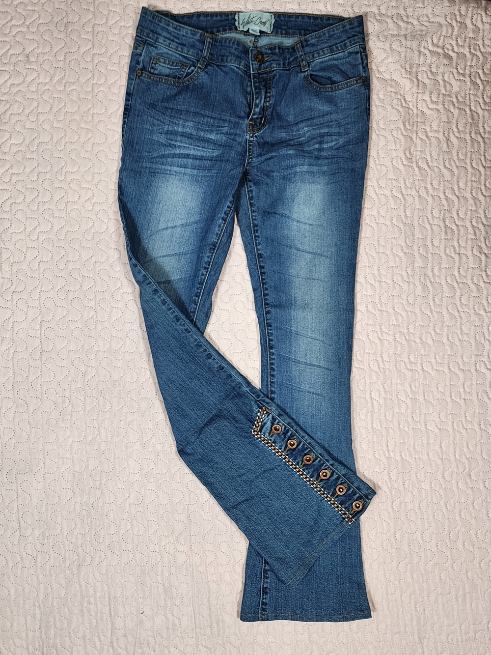 White Crow Medium Blue Flared Jeans with Button Hem Detail